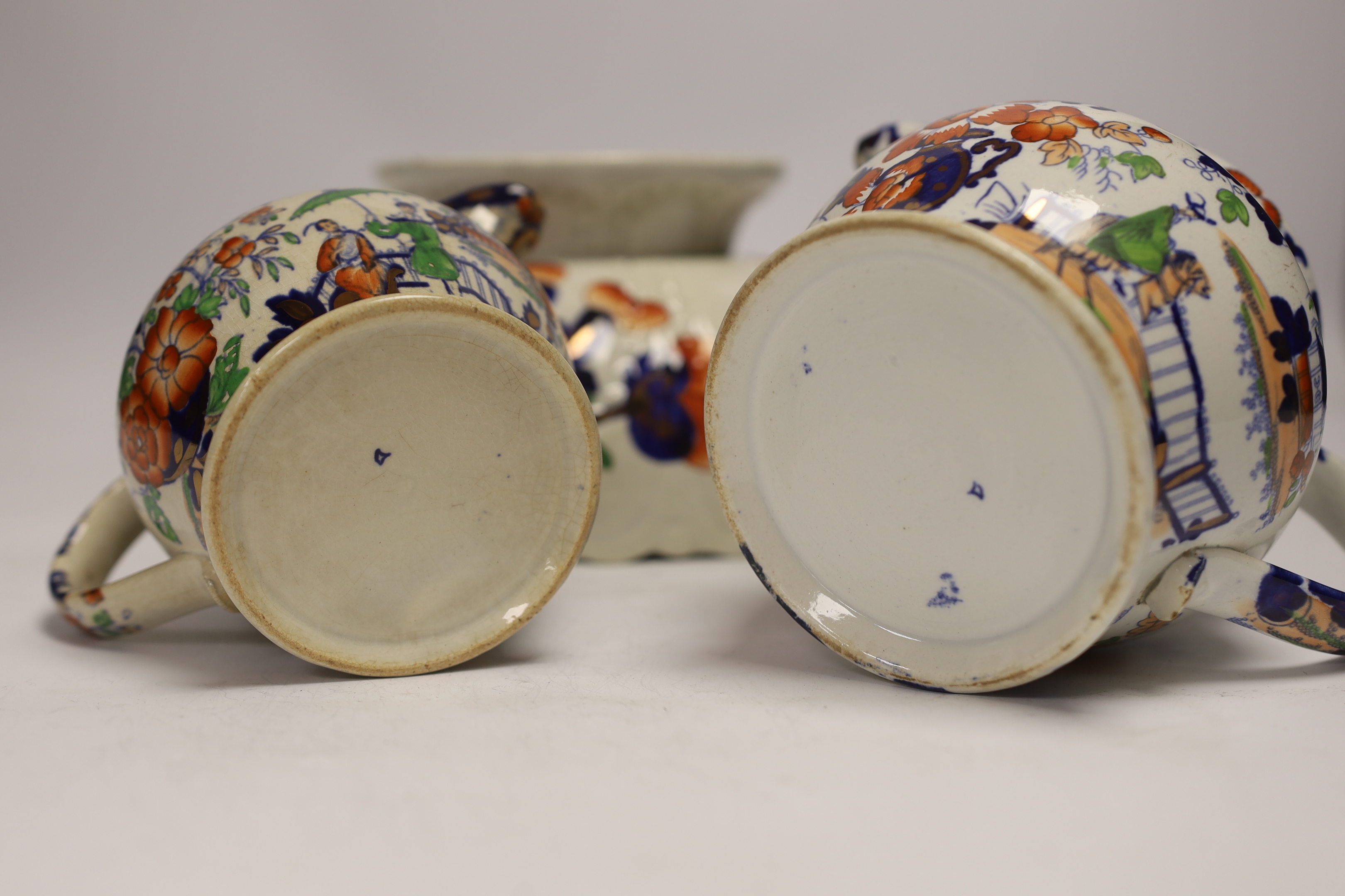 Five Welsh ‘Gaudy’ coffee cans, a large pedestal bowl and two Staffordshire jugs, bowl 21cm diameter